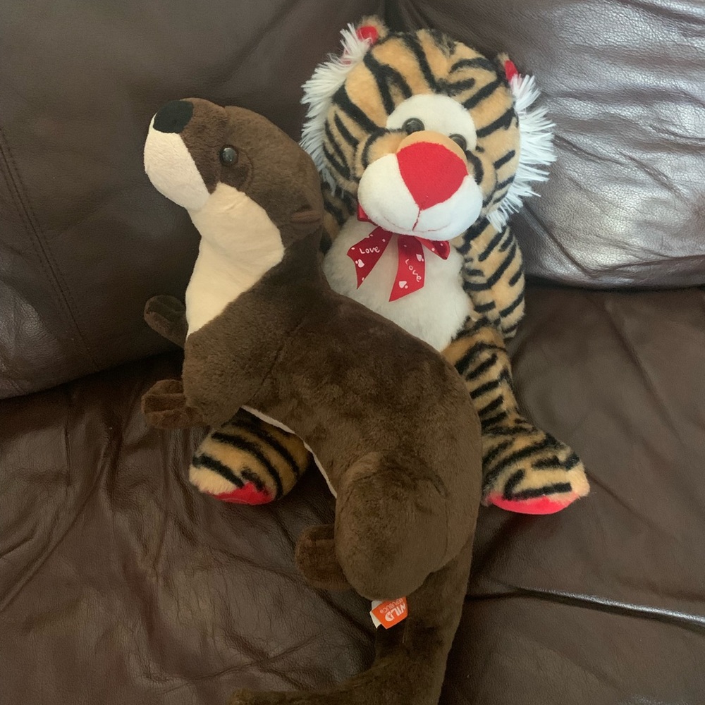 Brown and White Plush Otter Toy